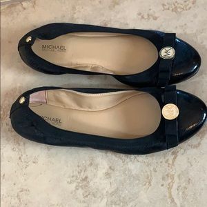 Adorable black flats by Michael Kors